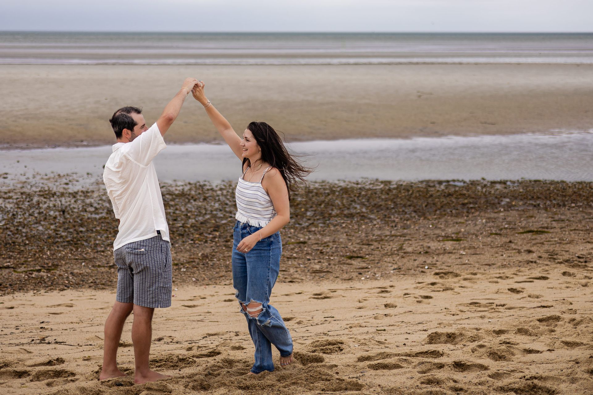 Cloudy Skies, Bright Future: Lauren & Max’s Heartfelt Proposal at Crosby Landing Beach - 2 - 1